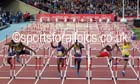Andrew Riley (Jamaica) wins the 110 metres hurdles from Will Sharman (England) at the Commonwealth Games, Glasgow. Photo: David T. Hewitson/Sports for All Pics
